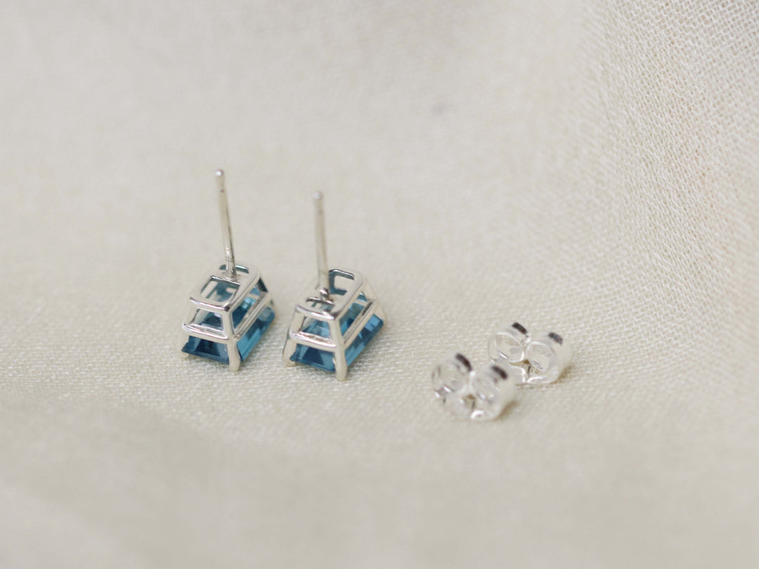 London Blue Topaz Stud Earrings - 7x5 Emerald Cut