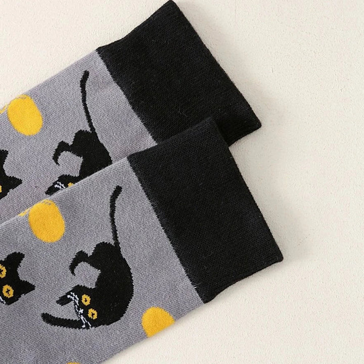 Black Cat Playing with Yarn Socks (Adult Medium)